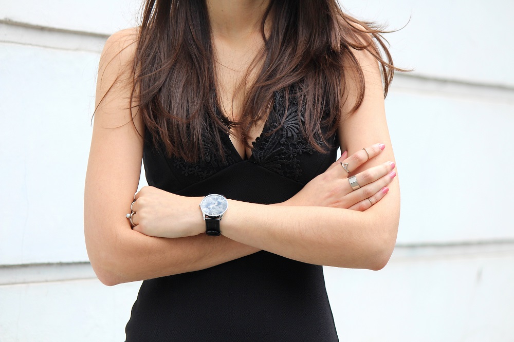 peexo fashion blogger wearing black bodycon midi dress and silver jewellery