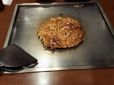 Japanese savoury pancake okonomiyaki Shinjuku Japan