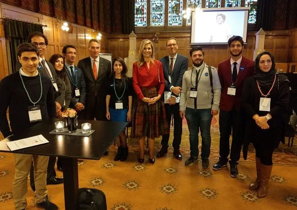 Queen Máxima opened Spark's fifth Ignite conference. Maxima wore Natan pattern skirt and Natan red blouse