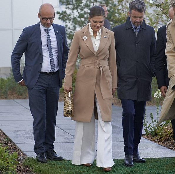 Crown Princess Mary wore Designers Remix Dress. Crown Princess Victoria wore a long cuff sleeve midi dress in beige