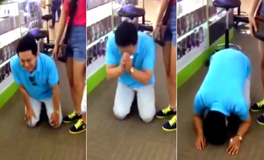 Vietnamese Man Kneels iPhone 6 Discount Singapore