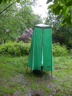 chemival toilet in flapping tent