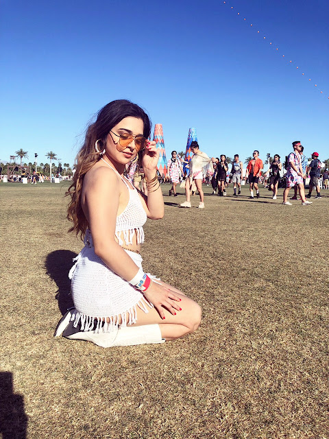 Coachella outfit picture of me sitting down.