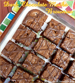 Dark Chocolate Mocha Brownies are a rich, thick dark chocolate brownie infused with coffee flavor and sprinkled with coffee candies. | Recipe developed by www.BakingInATornado.com | #recipe #chocolate
