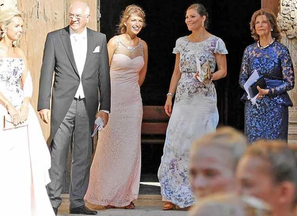 Princess Victoria wore VALERIE lace gown for Helena Christina Sommerlath and Ian Martin's wedding.