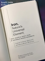 Iron, Nature's Universal Element:  Why People Need Iron and Animals Make Magnets,  by Eugenie Mielczarek, superimposed on Intermediate Physics for Medicine and Biology.