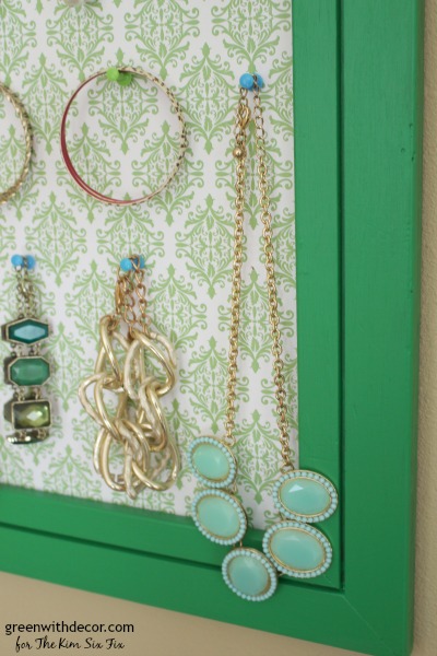 What a clever idea! An easy tutorial to turn an old frame into a pretty jewelry display.