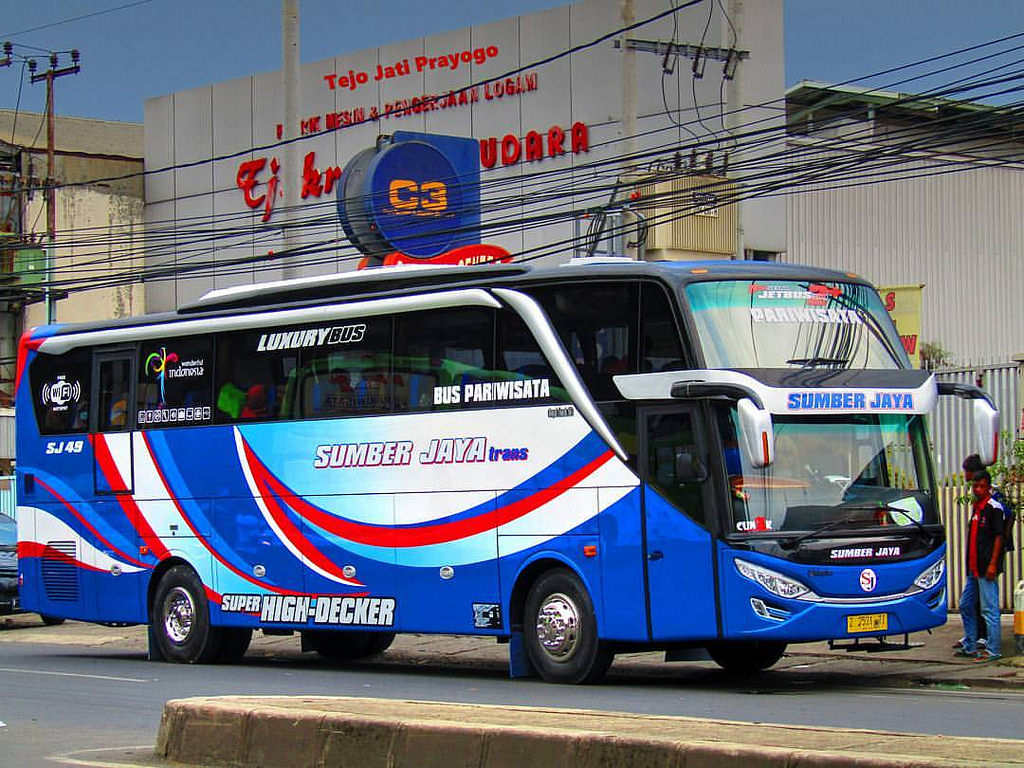 Sumber Jaya Trans: Mengurai Jejak Sang Raja Jalan Raya dalam Vektor