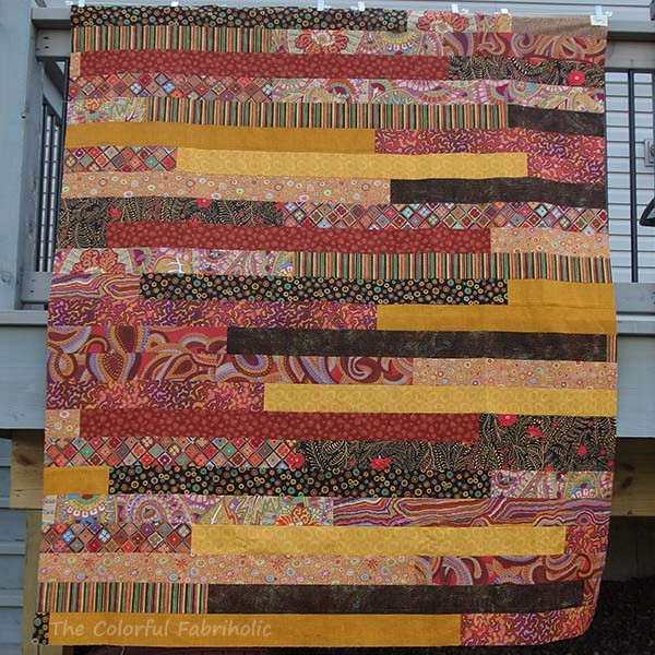 The Colorful Fabriholic Race Quilt for Hands2Help