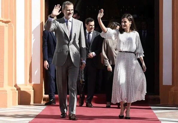 Queen Letizia wore Emporio Armani Crepon long dress with polka dot jacquard motif. Doñana Natural Park in Almonte