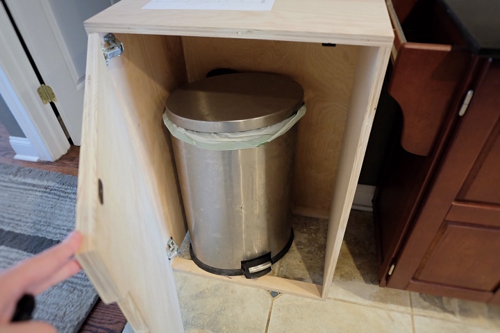 deciding on whether to use cabinet for garbage can