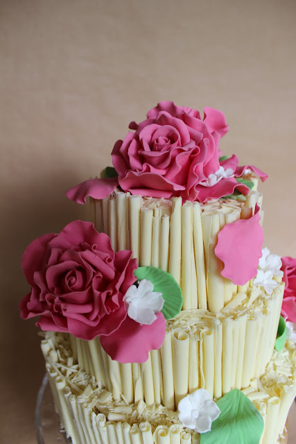 Wedding cake with white chocolate cigars