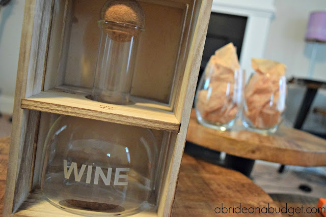 A great adult-friendly groomsmen gift idea is this personalized wine decanter. Find out all about it on www.abrideonabudget.com.