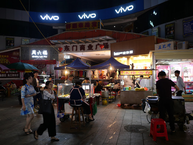 outdoor market at night in Yulin, China