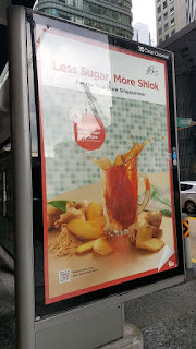 Less sugar, more shiok - a HPB bus stop ad in May 2018.