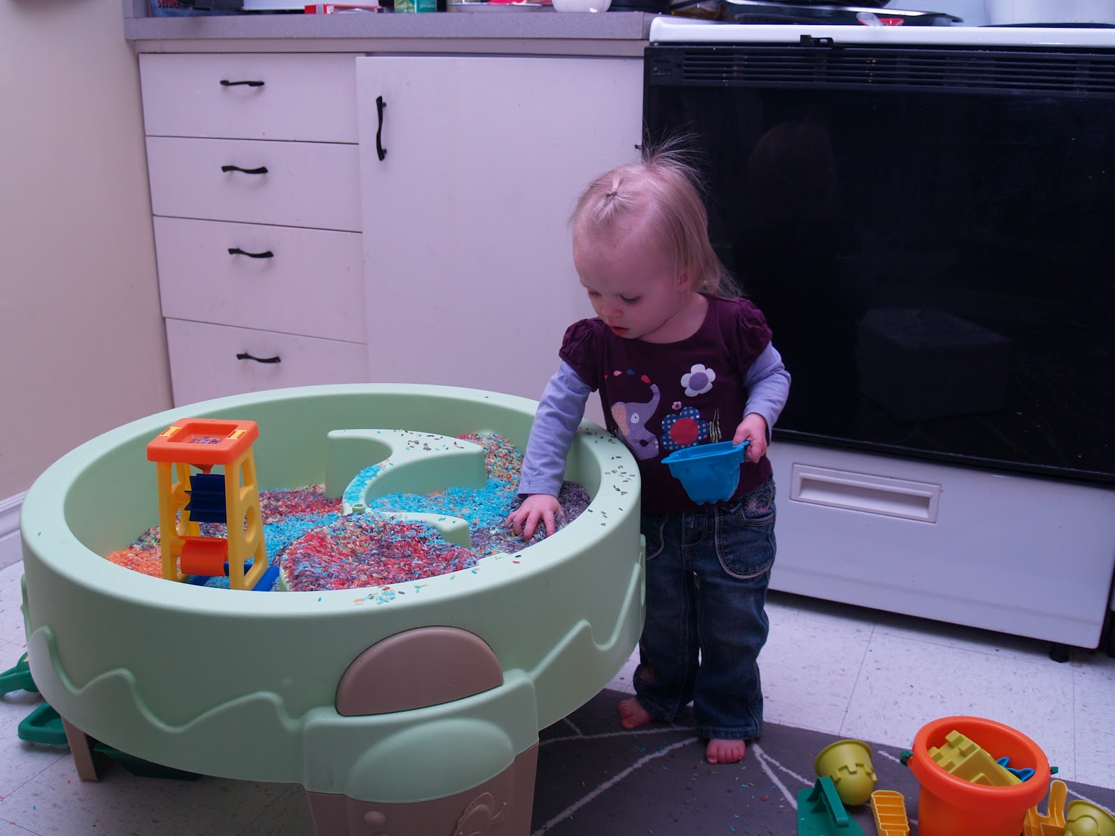 crafty-lineage-sensory-table-with-colored-rice
