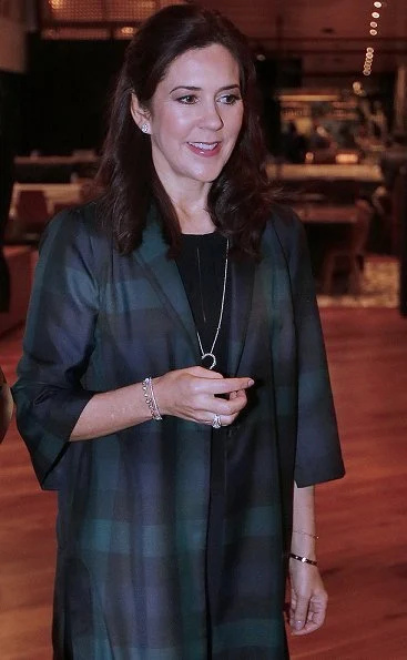 Crown Princess Mary wore a woven checked jacket by Baum und Pferdgarten. Crown Princess Mary is visiting Texas