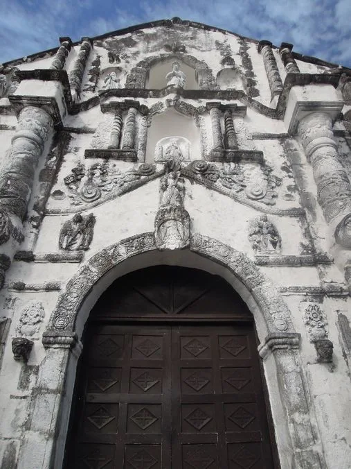 The door and intricate arch of Daraga Church