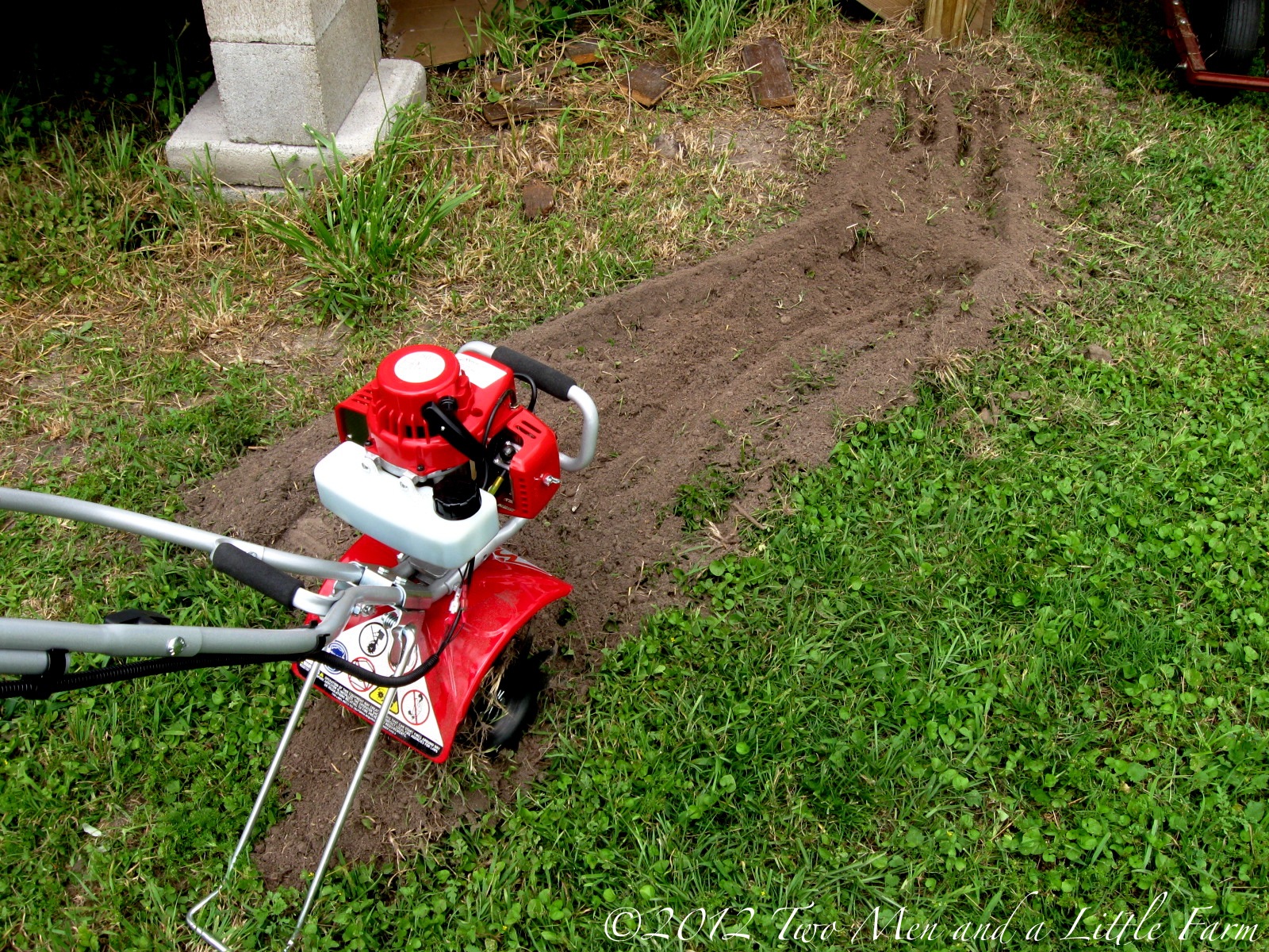 Two Men and a Little Farm TILLING THE FLOWER BEDS PART 1