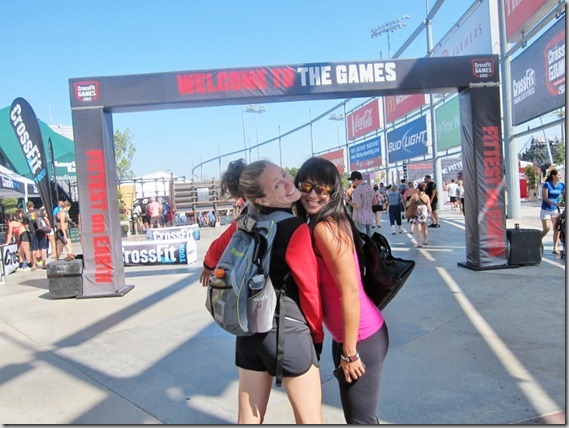 Heather Hart and Kelly Olexa pose for a photo outside of the entrance to the 2012 Reebok CrossFit Games