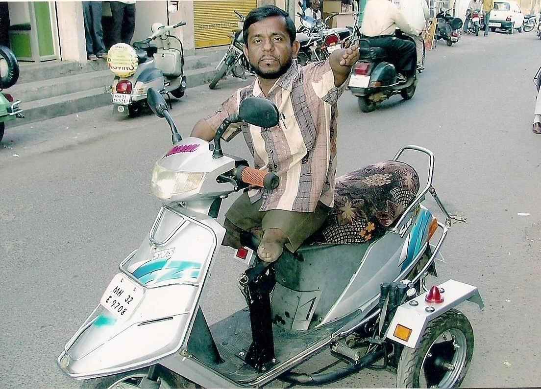 Images Modified scooters and mobikes for physically handicapped