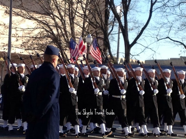 <img src="image.gif" alt="This is Navy Marching 57th Presidential Parade" />