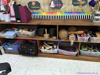 Be inspired by this farmhouse themed music room.  Rustic decor and bold accents help set this music classroom up for optimal learning.  Bulletin boards, flexible seating, organization ideas and more!