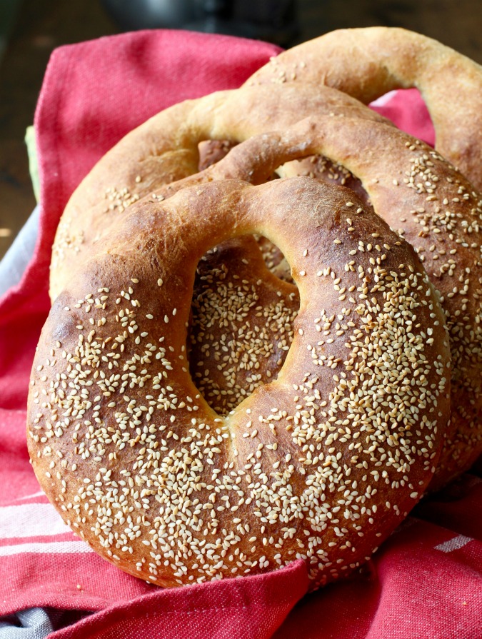 Kaak is a Lebanese street bread, shaped like a purse, coated in sesame seeds, and sold from carts by street vendors.