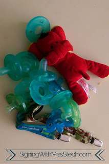 pile of no longer needed pacifiers