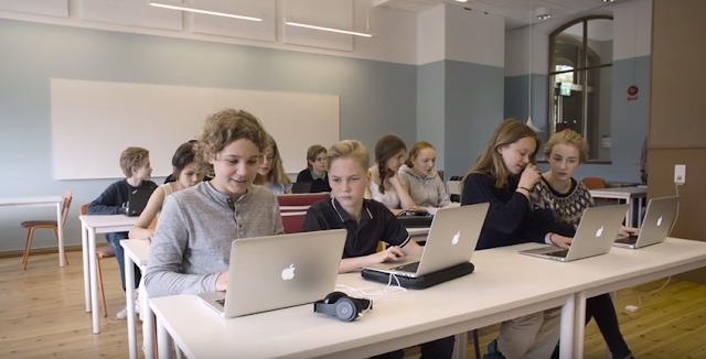 Kids playing Minecraft on Apple computers Minecraft Education Edition trailer children kids students Apple computers Macbooks