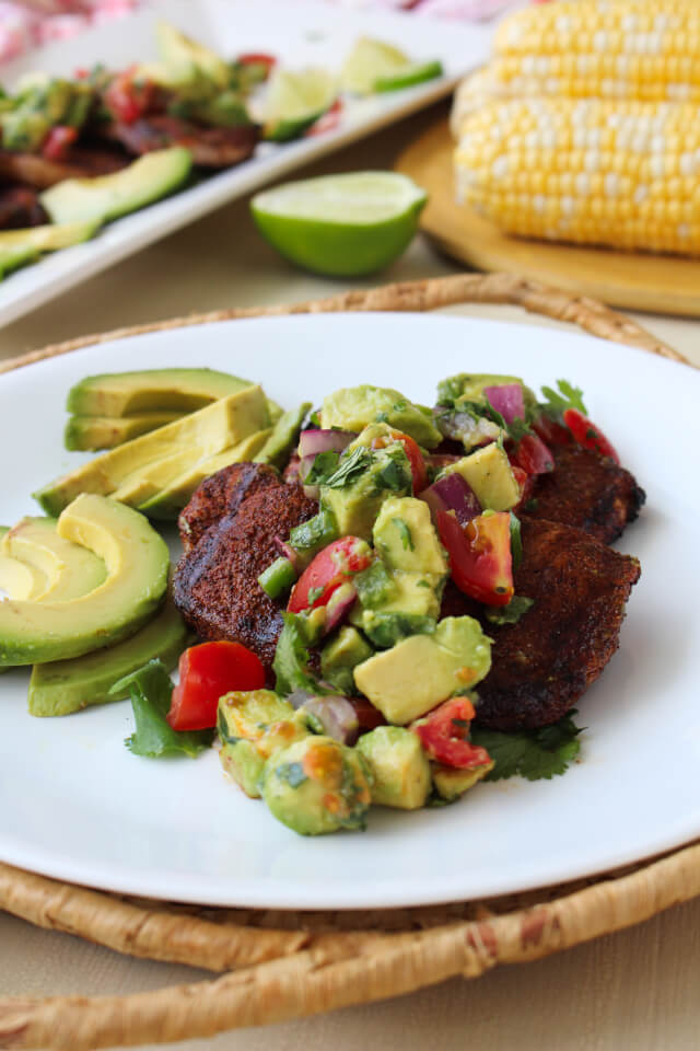 This Grilled Pork Chops with Avocado Salsa recipe is the perfect way to add bold, fresh flavor to your next grilling night or backyard barbecue! #AllNaturalPork @Walmart @SmithfieldFoods #AD