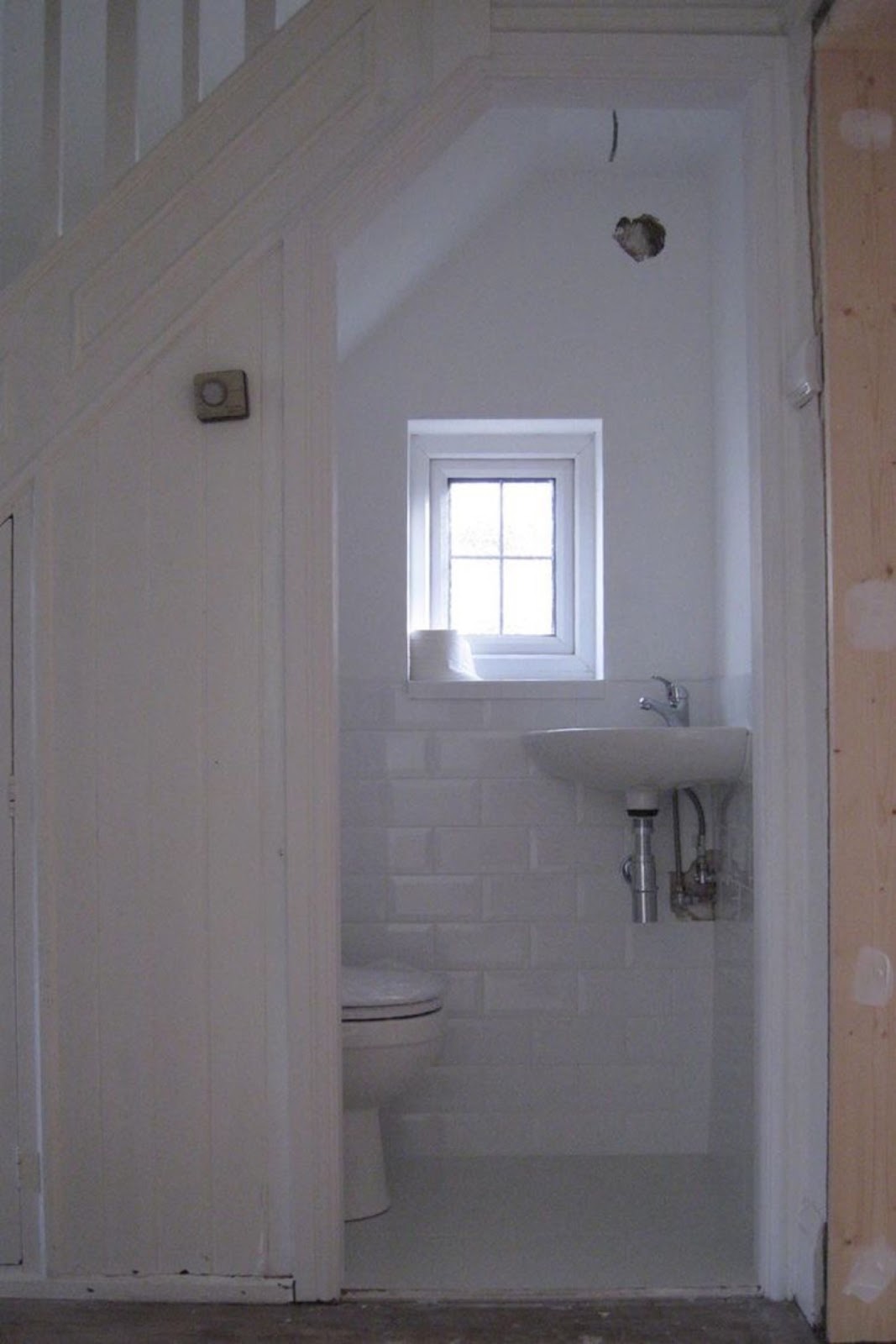Content in a Cottage: Powder Room Under The Stairs