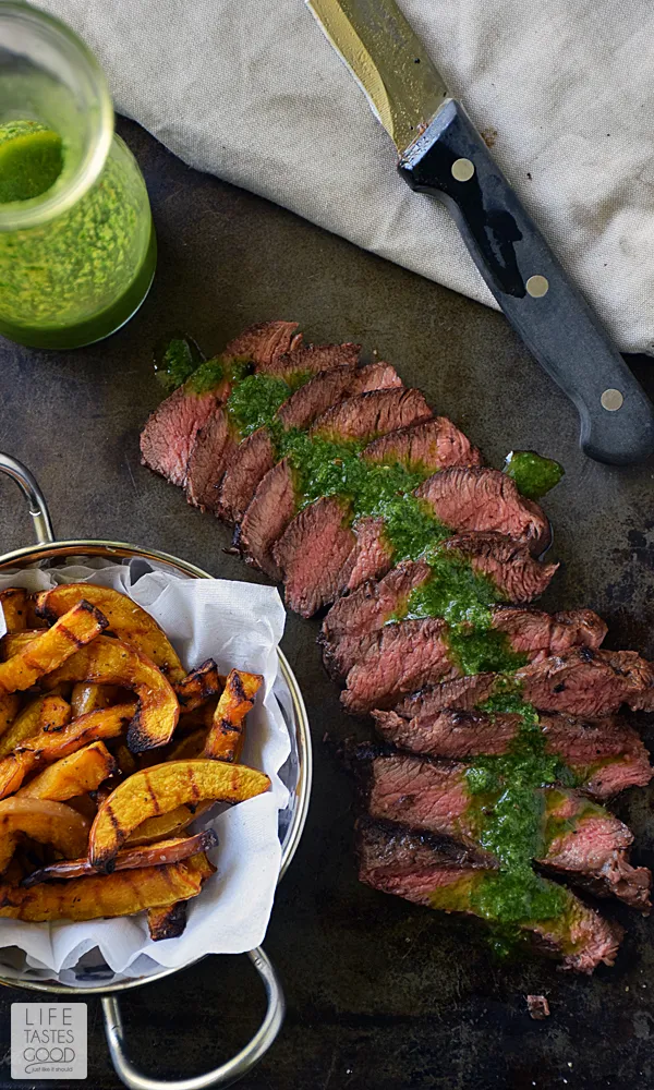 Pan-Seared Steak with Chimichurri sauce | by Life Tastes Good is an easy to make dinner any night of the week! Flat-iron steak is one of the most flavorful cuts, and it is more budget-friendly than some other popular cuts, which makes it a great choice for WeekdaySupper! #LTGrecipes