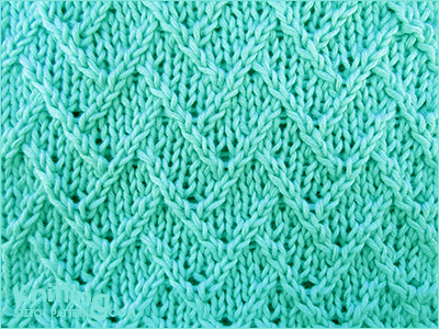 Fractured Lattice utilizes twisted stitches. No cable needle required