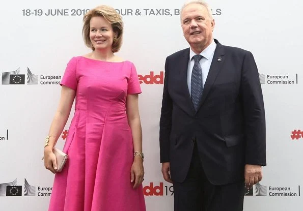 Queen Mathilde wore a new pink midi dress by Natan