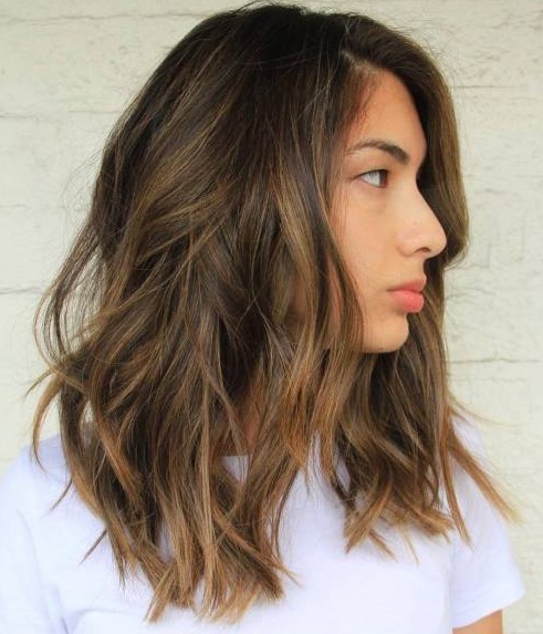 Comparado con el caramelo, auburn podría ser una opción menos popular de color de pelo para balayage marrón, pero es no menos hermoso.