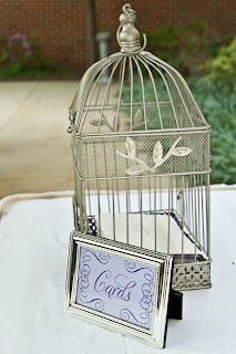 Sign for cards with a birdcage