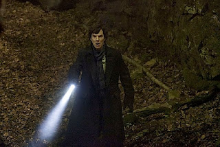 Benedict Cumberbatch as Sherlock Holmes faces the Hound in The Hounds of Baskerville