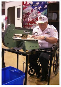 http://theartfactory.com/product/wheelchair-accessible-adjustable-height-scroll-saw-stand/