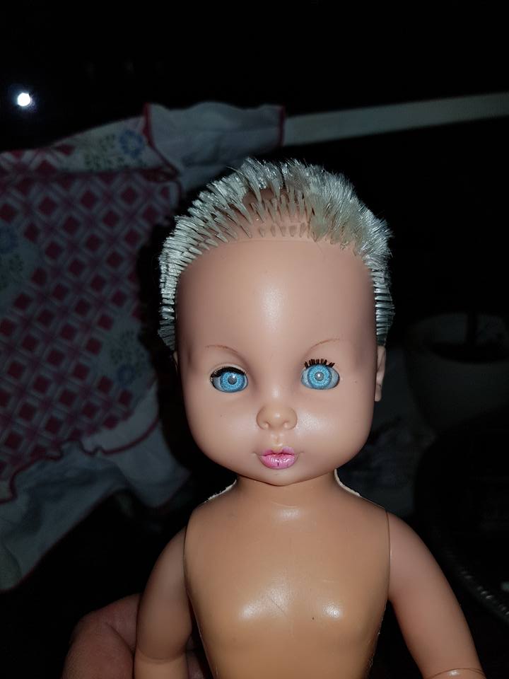 barbie with hair cut off