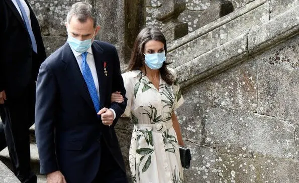 Queen Letizia wore a new printed shirt dress from Pedro del Hierro, and nude patent leather slingback pumps from Carolina Herrera