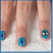 Nails Decorated with One of the Characters of Inside Out Film: Sadness. 