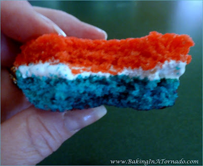 Red Fluff and Blue Cookies, for 4thof July or any time, soft sugar cookies with a marshmallow filling. | Recipe developed by www.BakingInATornado.com | #recipe #cookies #snack