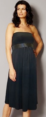 Vestido Foto de mujer con vestido de maternidad largo debajo de la rodilla