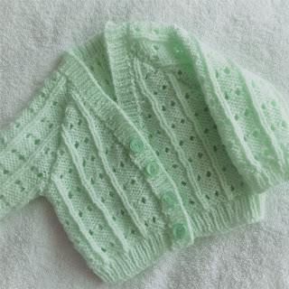 https://www.craftsy.com/knitting/patterns/lily-s-eyelet-baby-cardigan/491500