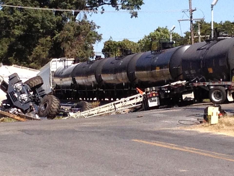 Just A Car Guy the driver got out of the semi, and then the train