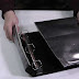 Man disassembles a common folder to show the perfect security trick for home