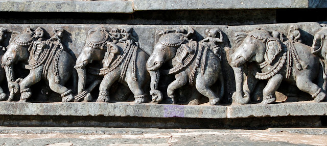 There are about 1248 of these elephants on the base of the temple wall, each one carved uniquely