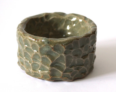glazed carved pottery bowl