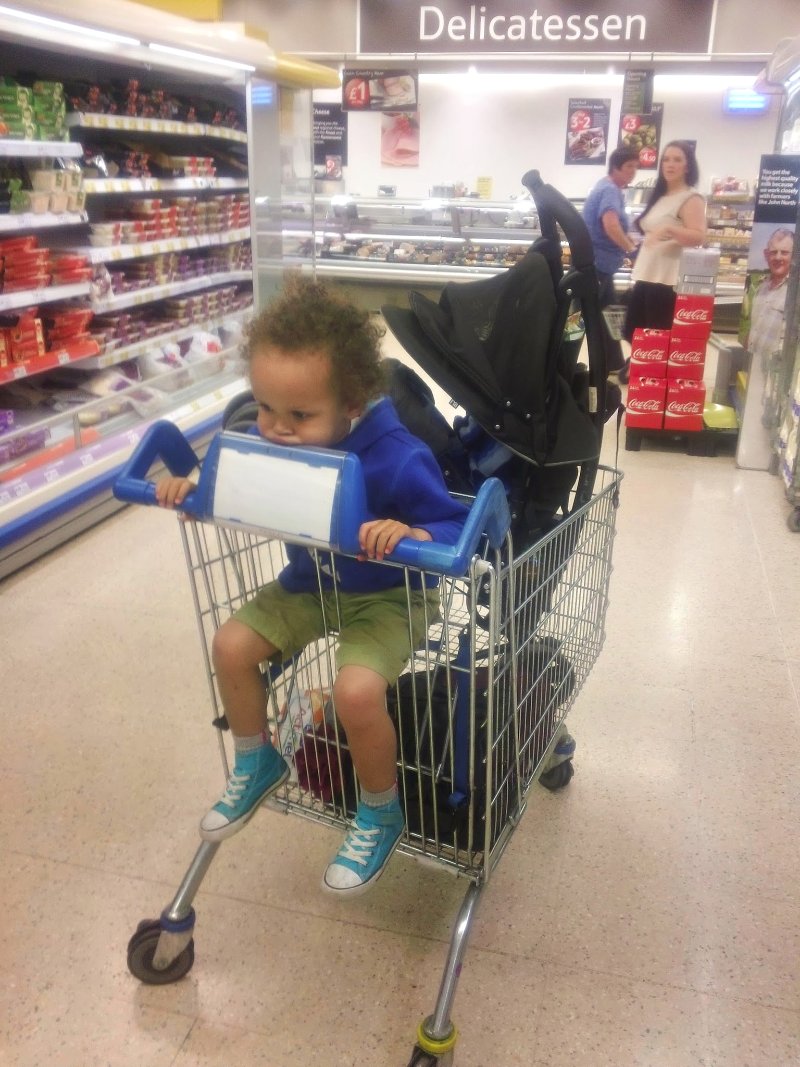 Buggy in supermarket trolley